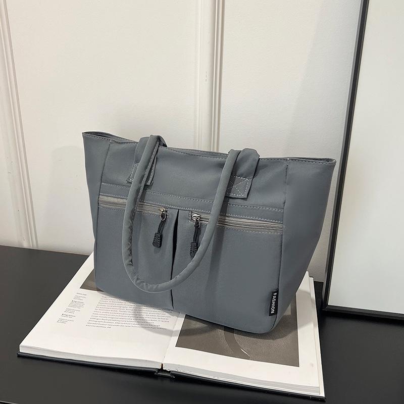 

Lazy wind large-capacity tote bag new simple casual canvas bag solid color shoulder bag commuter women s bag серый
