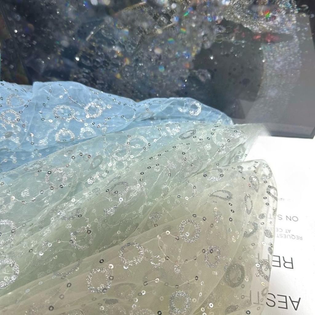 Embroidered sequin round patchwork net fabric suitable for wedding dresses formal gowns and designer clothing fabrics
