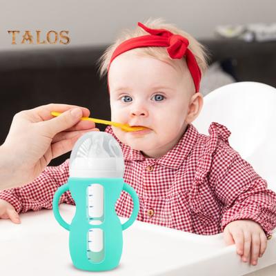 Funda para biberón Philips de 4/8 oz de vidrio, de silicona, con asas de fácil agarre para proteger contra caídas y reducir la exposición al plástico.
