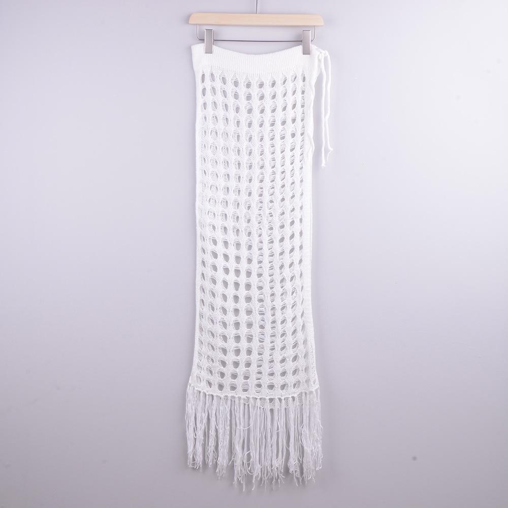 

Порожня міді-спідниця: Європейський та Американський прозорий в язаний светр Весна/Літо 2024 з розрізом та китицями One size білий