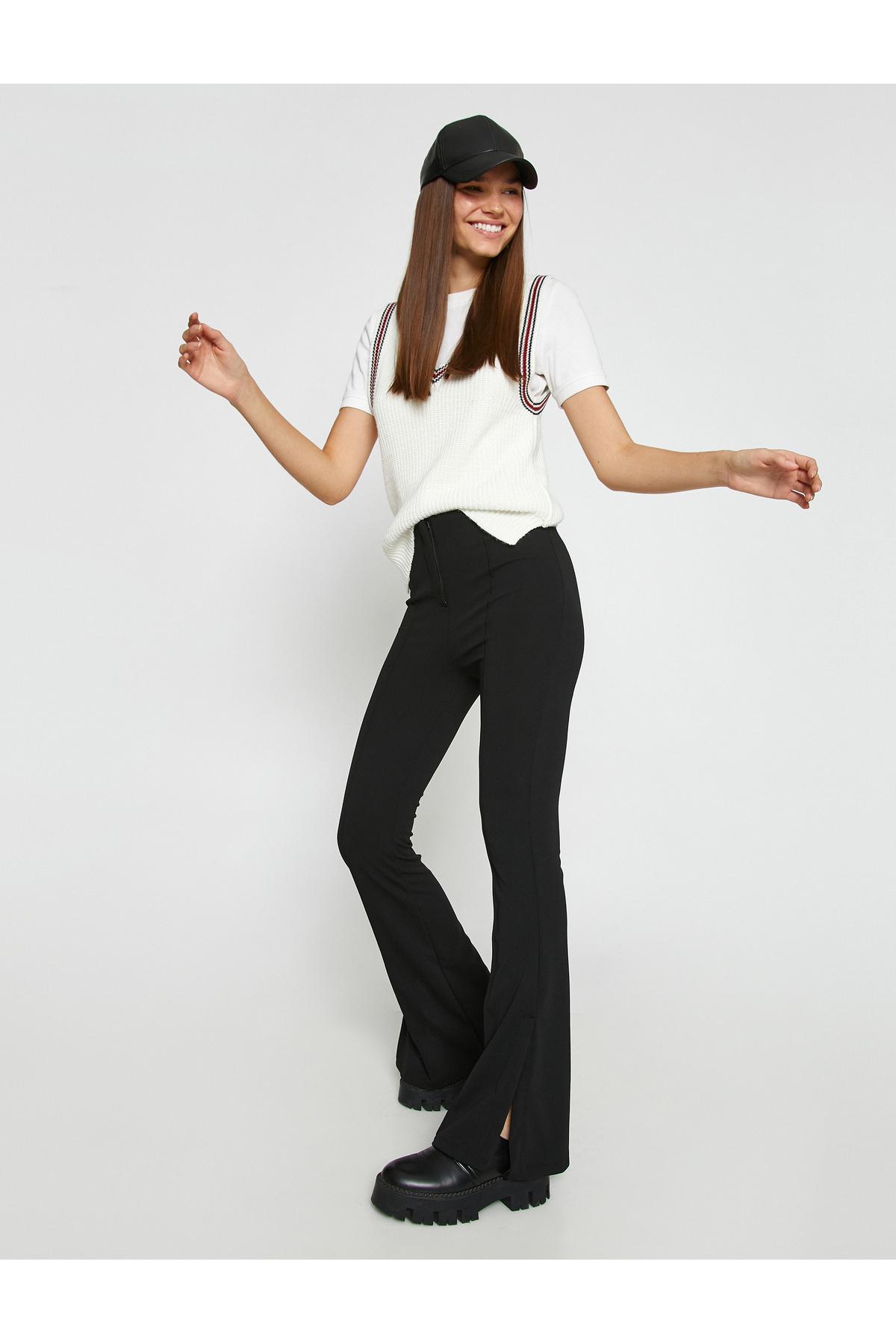 

Испанские брюки с разрезами в рубчик..