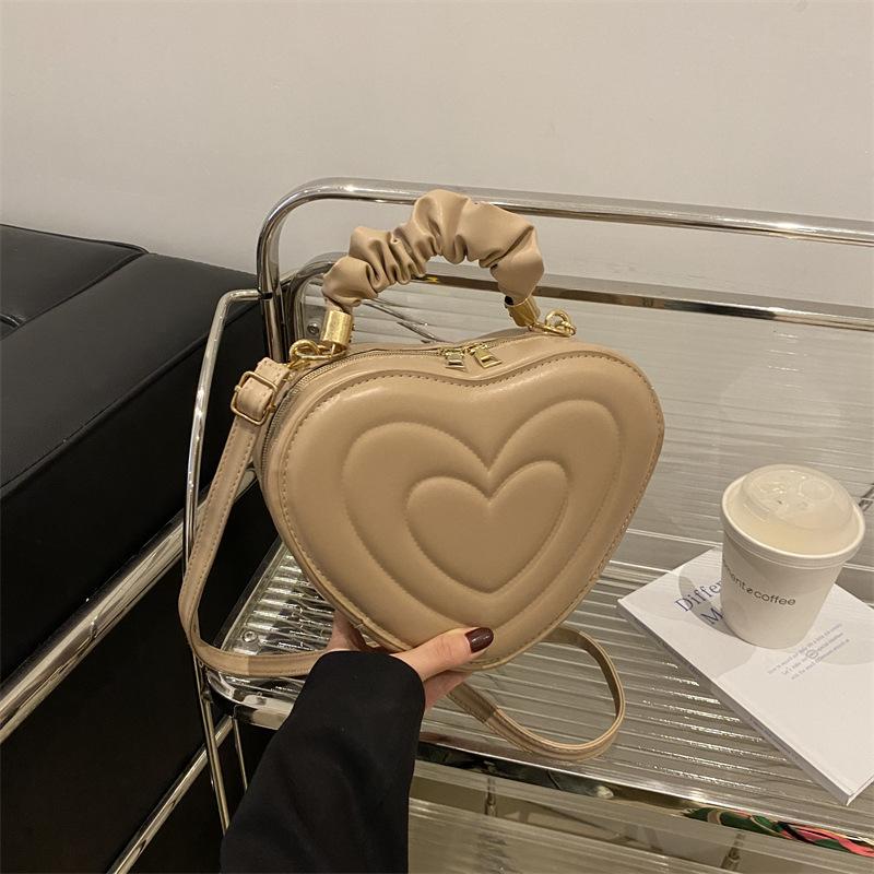 Modetrend lässige Umhängetasche Retro Winter kleine Tasche Damen neue Textur schräger Überschlag Liebestasche
