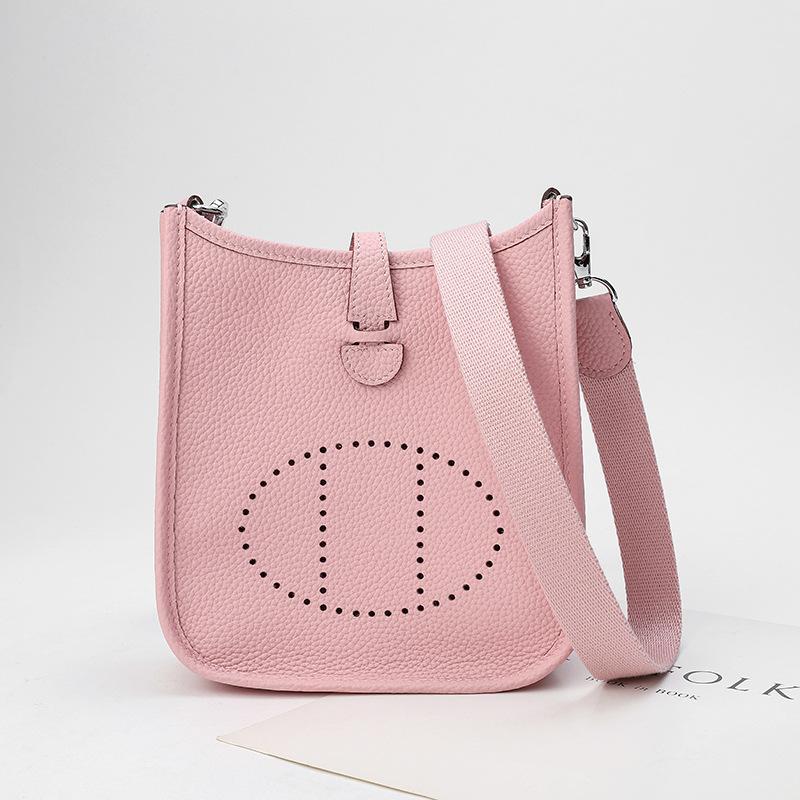 Factory wholesale first layer togo cowhide bucket bag women's bag lychee pattern hollow single shoulder crossbody bag hollow design