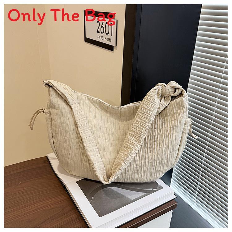 Sac cabas urbain minimaliste pour femmes avec design plissé et fermeture éclair pour un usage quotidien