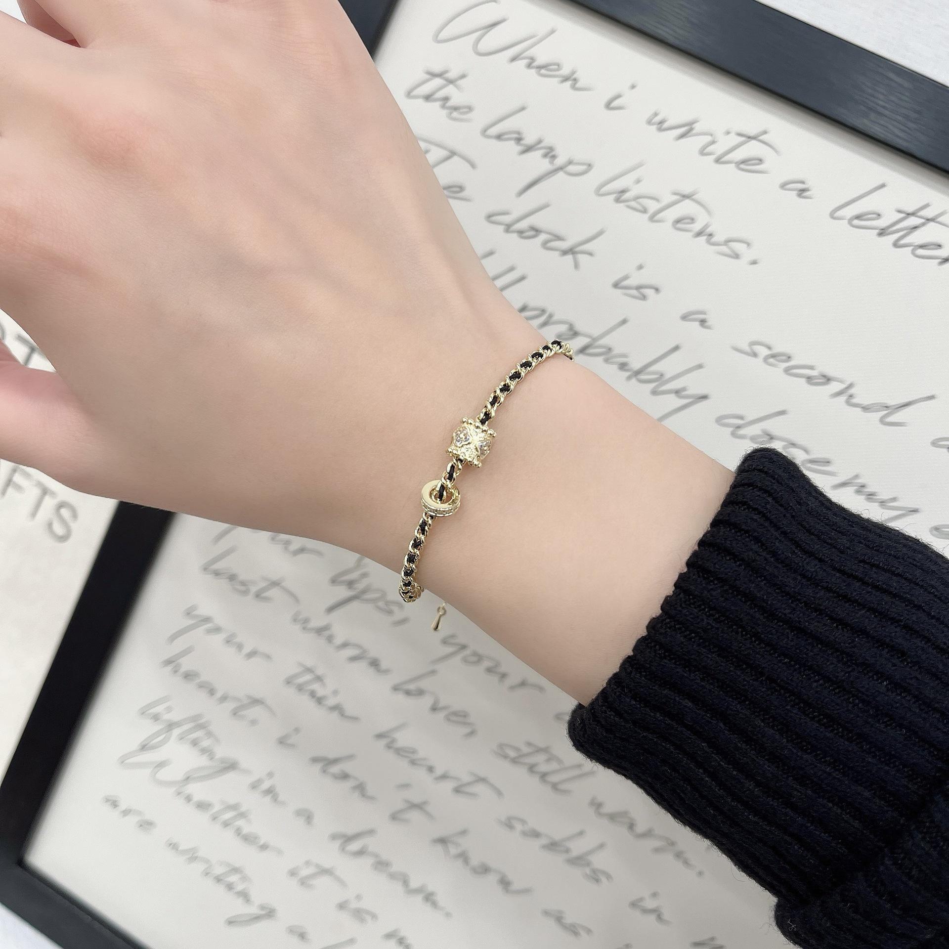 

Вдохновленный женский плетеный браслет из золота и черного цвета - простой, модный, броский дизайн цепочки S0442 Lulutong Zircon String Chain чёрный