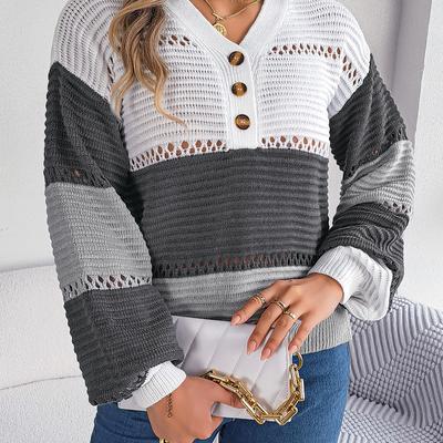 Herbst und Winter Lässiger Knopf V-Ausschnitt Cut-out Farbe Laternenärmel Pullover Damenbekleidung