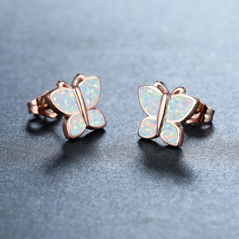 In the wind new white gold rose gold white blue butterfly stud earrings temperament versatile earrings