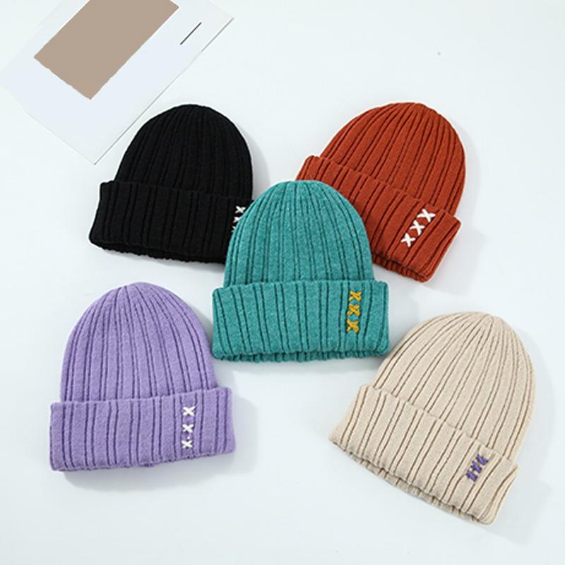 New candy color handmade design versatile autumn and winter personalized men and women solid color fork wool knitted hat cold hat tide