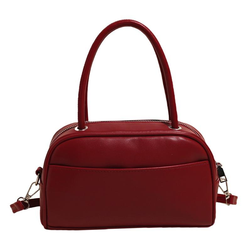 Spring and summer new Korean version niche solid color texture portable pillow bag fashionable commuter style versatile casual messenger women's bag