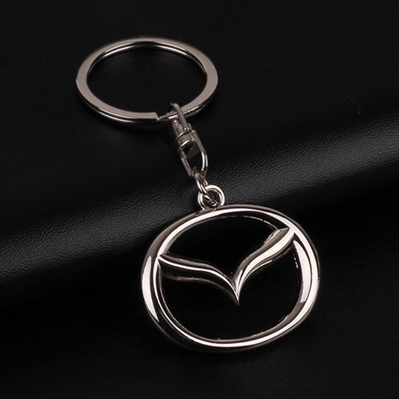 1 dona 3D Metall Avtomobil Nishoni Kalit Halqasi Sink Qotishmasidan Kalit Halqalar Mazda 6 3 CX5 5 2 323 CX7 Demio Atenza Axela MX30 CX30 CX3 CX9 RX8 RX7 uchun Avto Aksessuarlar