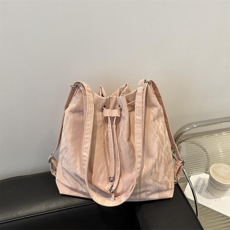 

Large capacity bag women s 2025 new travel backpack design sense niche shoulder bag multi-purpose commuter backpack