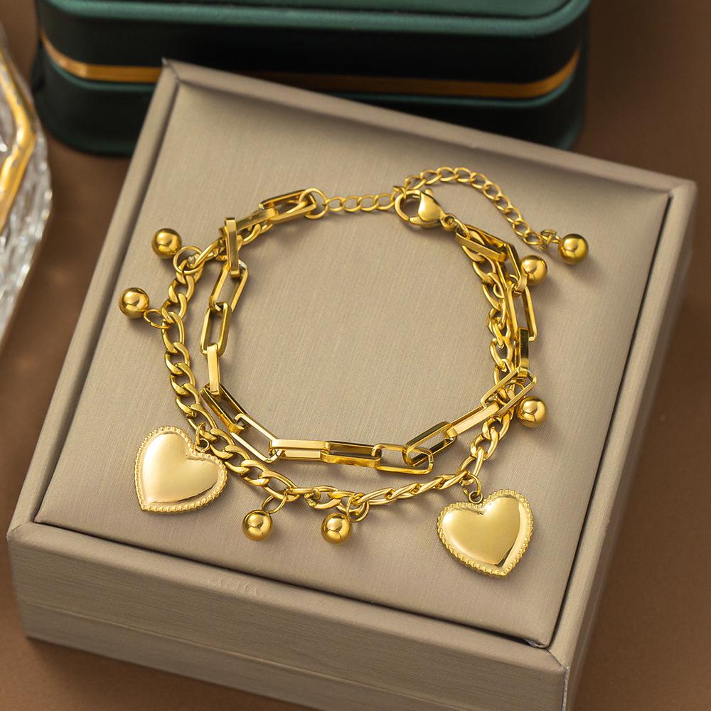 

Yicen European & American Double-Layer Heart Bracelet - Stainless Steel Fashion Jewelry Trendy Accessory.