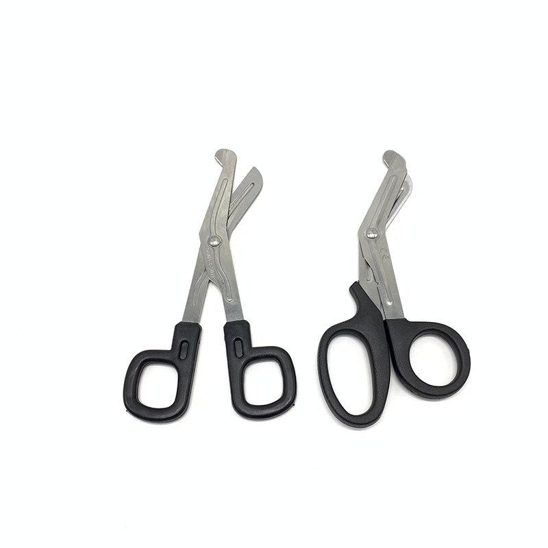 Kinesiologie-Tape und Verbandschere aus Edelstahl