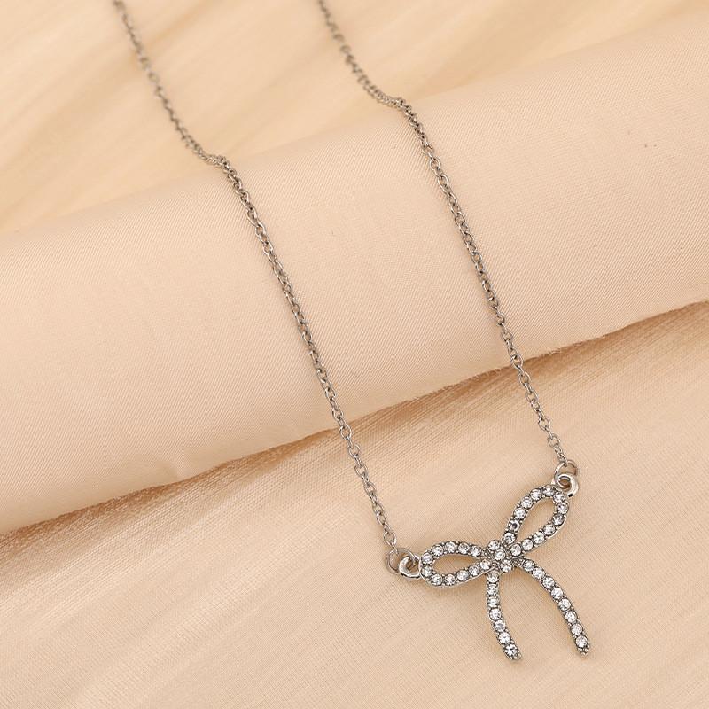 Chic Titanium Steel Bow Pendant Necklace For Women With Dazzling Diamond Inlay