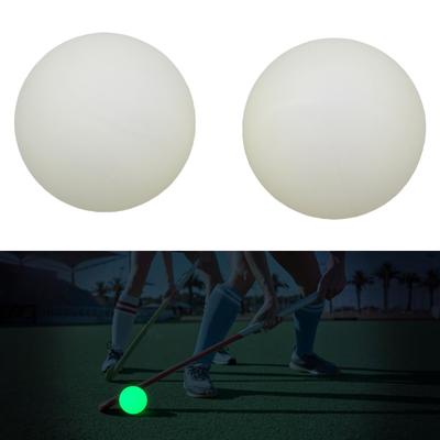 2 pelotas de hockey callejero que brillan en la oscuridad. Ideales para hockey sobre césped.