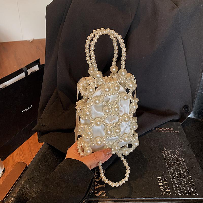

This year s popular handbag 2025 summer new women s bag foreign style beaded shoulder bag personalized contrasting color messenger bag tide білий
