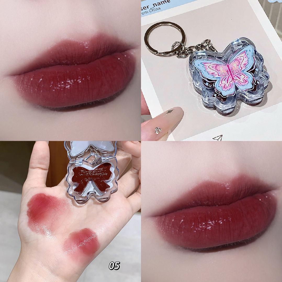 OUOII Luminous Butterfly Lip Tint: Glossy, Plump, Long-Lasting, Moisturizing, Low-Saturation Lip Oil.