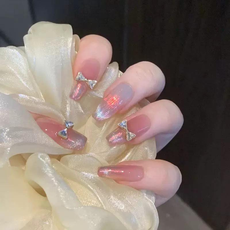 

Handmade Press-On Nails: Gel Crystal Cat Eye with Bling Bow and Aurora Finish Medium