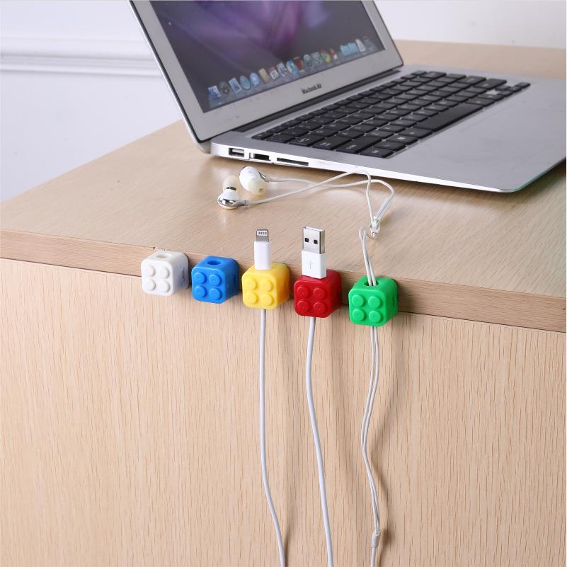 Building block fixed cable device, data cable buckle magnetic suction cable manager, desktop cable manager, buckle hub, mobile phone cable storage