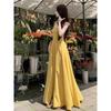 Seaside vacation yellow suspender dress, the new super good-looking, unique and beautiful waist pinch dress, children's summer