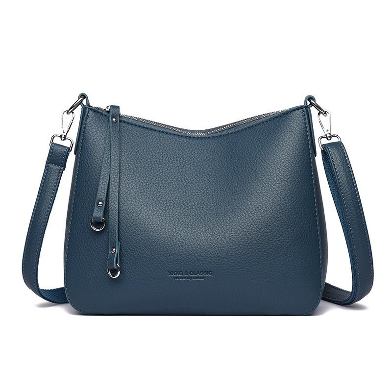 

New Chinese women s bag temperament solid color versatile retro shoulder bag fashionable texture crossbody mother bag синій