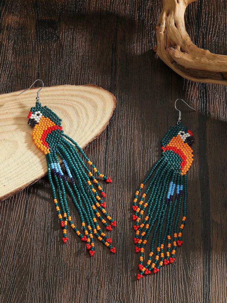 A pair of handmade beaded long earrings for women, in various colors, with tassels and woven patterns, suitable for everyday wear and vacations.
