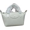 2025 Factory first layer vegetable tanned cowhide dumpling bag women's bag crossbody small bag genuine leather handbag retro genuine leather