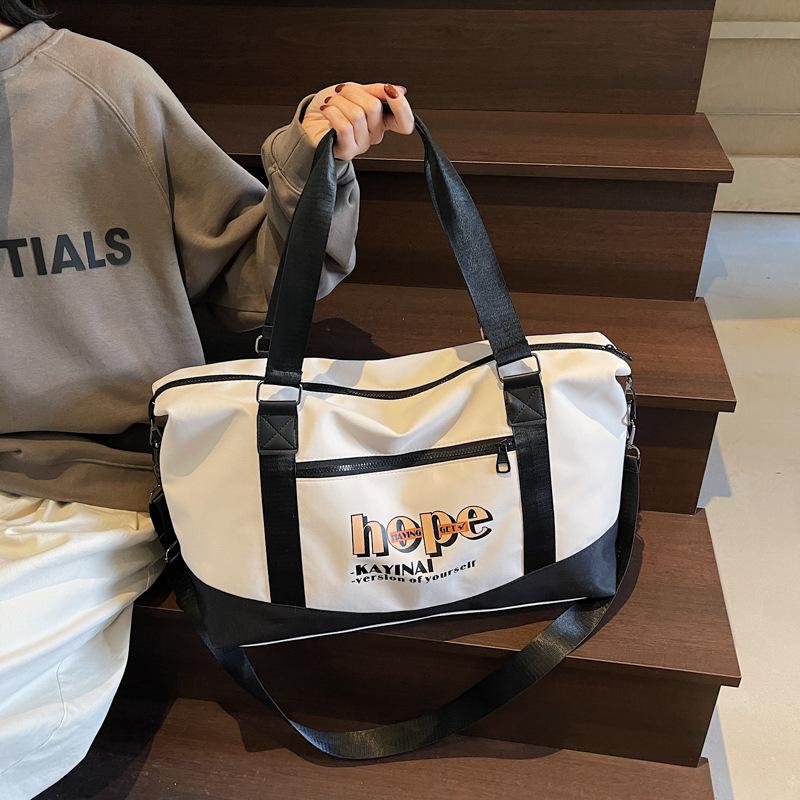 Color matching fitness bag Large capacity letter printing Light dry and wet separation Luggage bag Convenient shoulder messenger travel bag