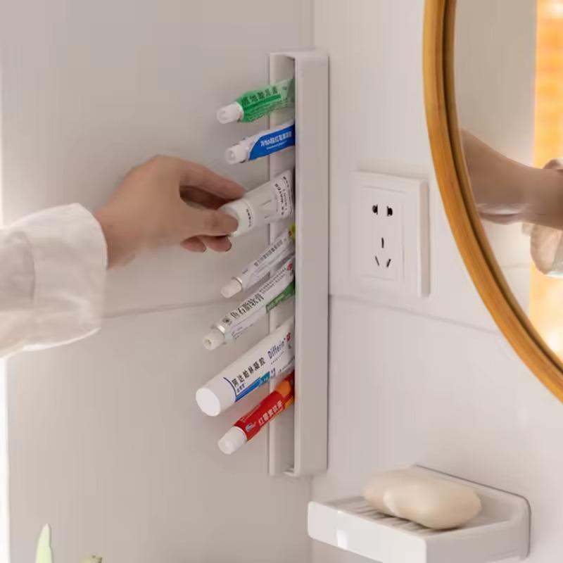 Xiaomi Toothpaste Holder Toothpaste Holder Facial Cleanser Punch-free Home Bathroom Toothbrush Holder Wall Clamp Storage