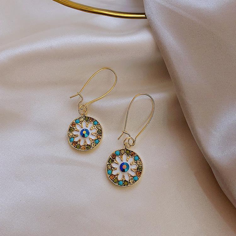 2025 new trendy French romantic disc earrings temperament literary and retro style earrings human studs