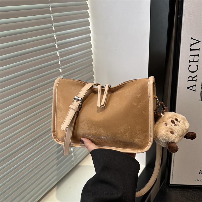 

This year s popular bag women s 2025 new casual versatile textured messenger bag high-end commuter shoulder pillow bag single bag коричневый