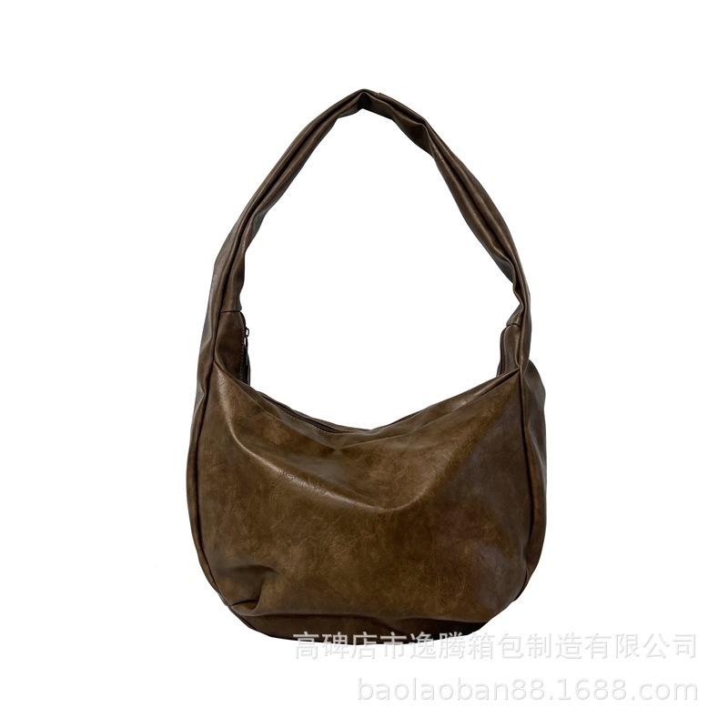 Retro men's and women's shoulder bags Crossbody dumpling bags Large capacity tote bags Fashion bags Student leisure bags