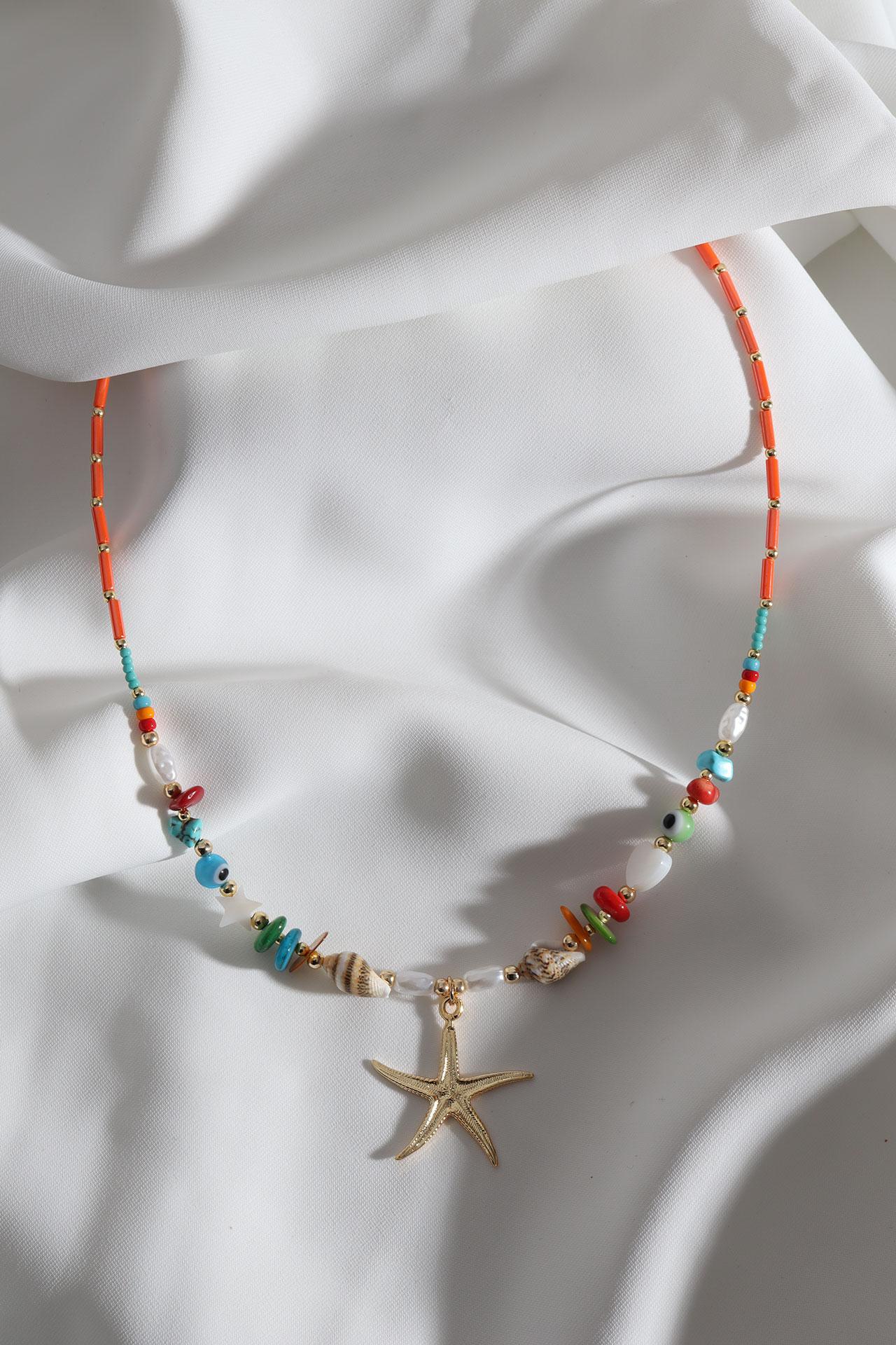 

Ожерелье из оранжевых бусин с подвеской в ​​виде морской звезды