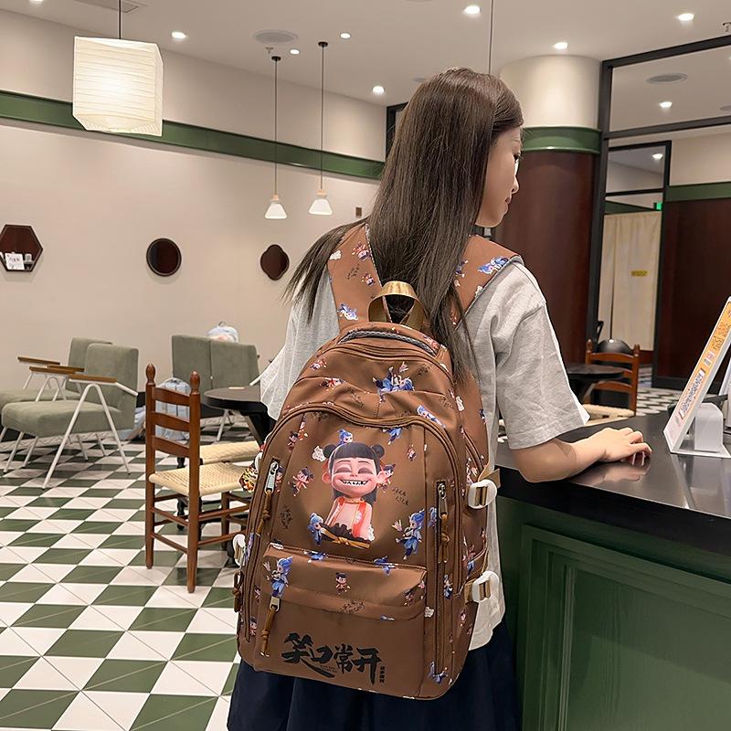 Schoolbag1011 new large-capacity multi-compartment versatile primary school bag personalized graffiti cartoon niche design backpack