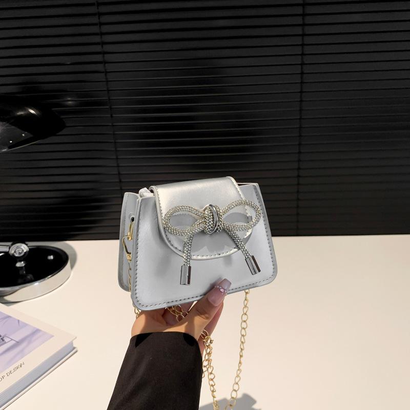 

Autumn new trendy fashion sweet bow small square bag mini small bag 2025 versatile chain crossbody bag 10.5*14*5.5cm серебряный