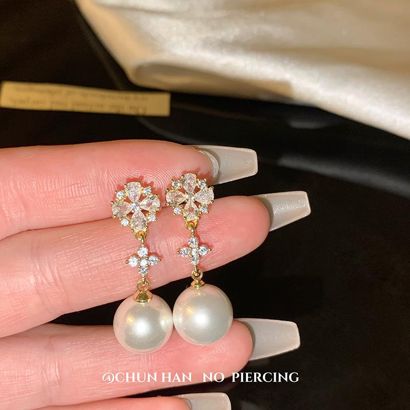 Snowflake Pearl Ear Clips Without Ear Pierced Earrings Women's Light Luxury Design Sense Hollow Long Petal Temperament Earrings Mosquito Coil Disc