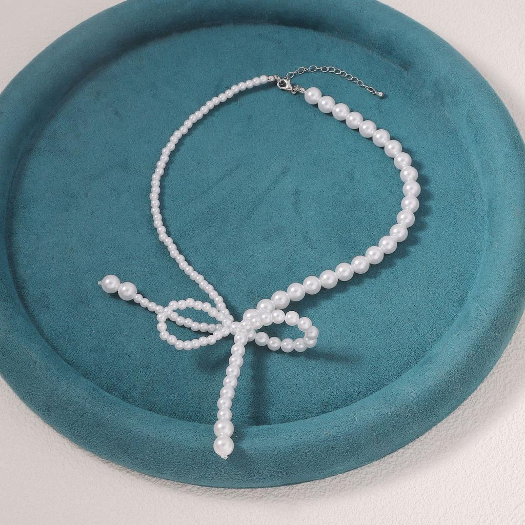 French Light Luxury Asymmetrical Pearl Bow Collarbone Chain Simple Sweet Cool Elegant Temperament Fringe Necklace
