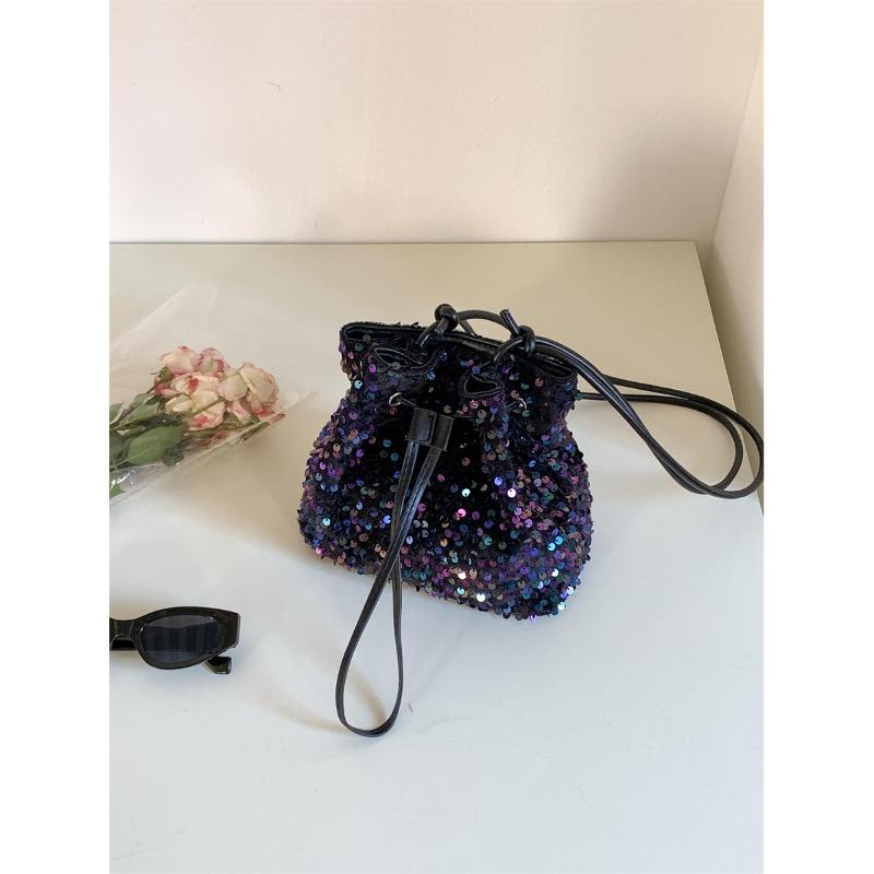 

Spring and summer new bucket bag women s fashion trend shoulder messenger bag women s drawstring pleated color sequin bag