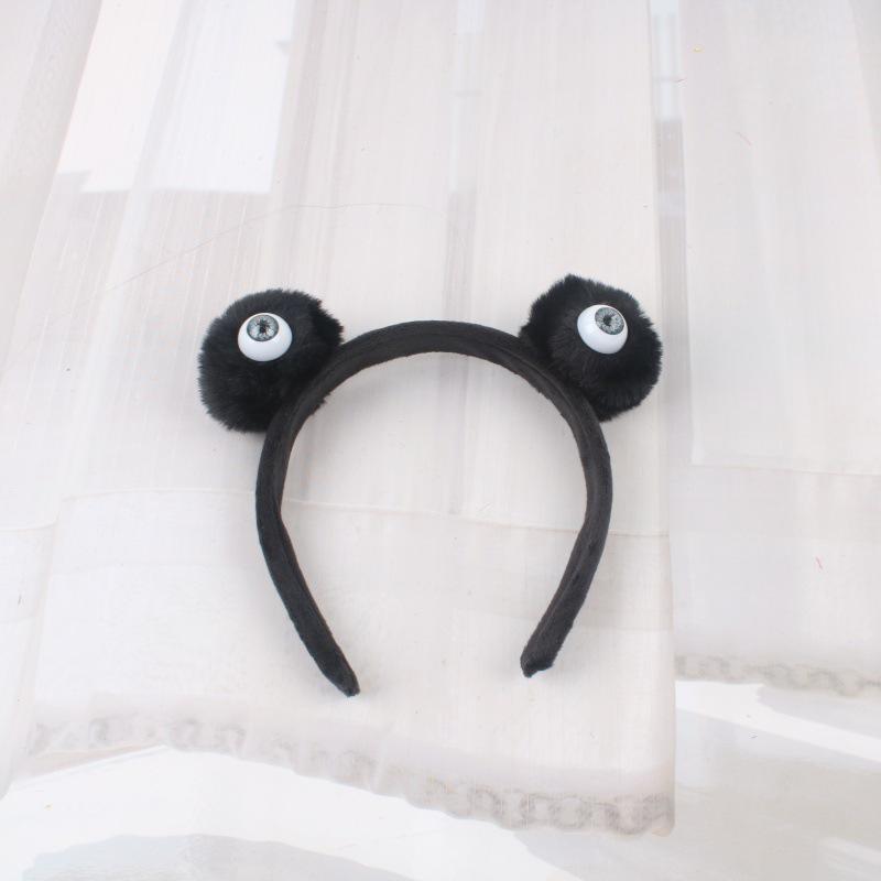 Entzückendes Plüsch-Kohlemonster-Stirnband mit Kulleraugen - Perfekt für Herbst-/Winter-Frisuren oder die Make-up-Routine.