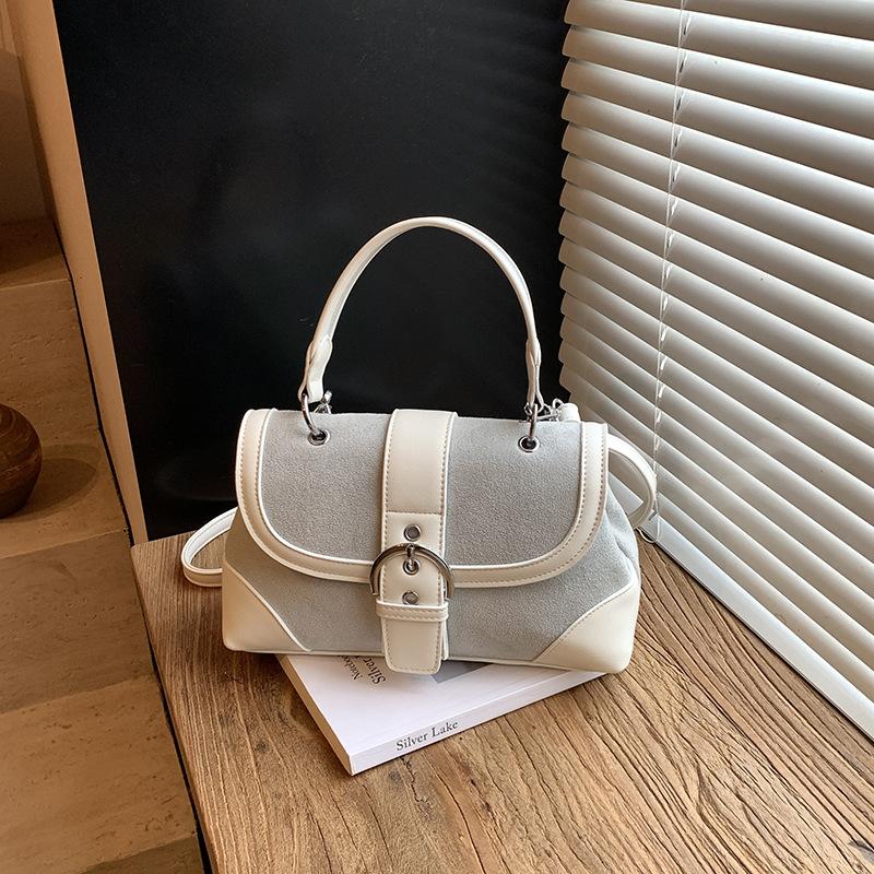 

Fashion retro niche contrasting color handbag large capacity fashion belt buckle saddle bag texture foreign casual women s bag
