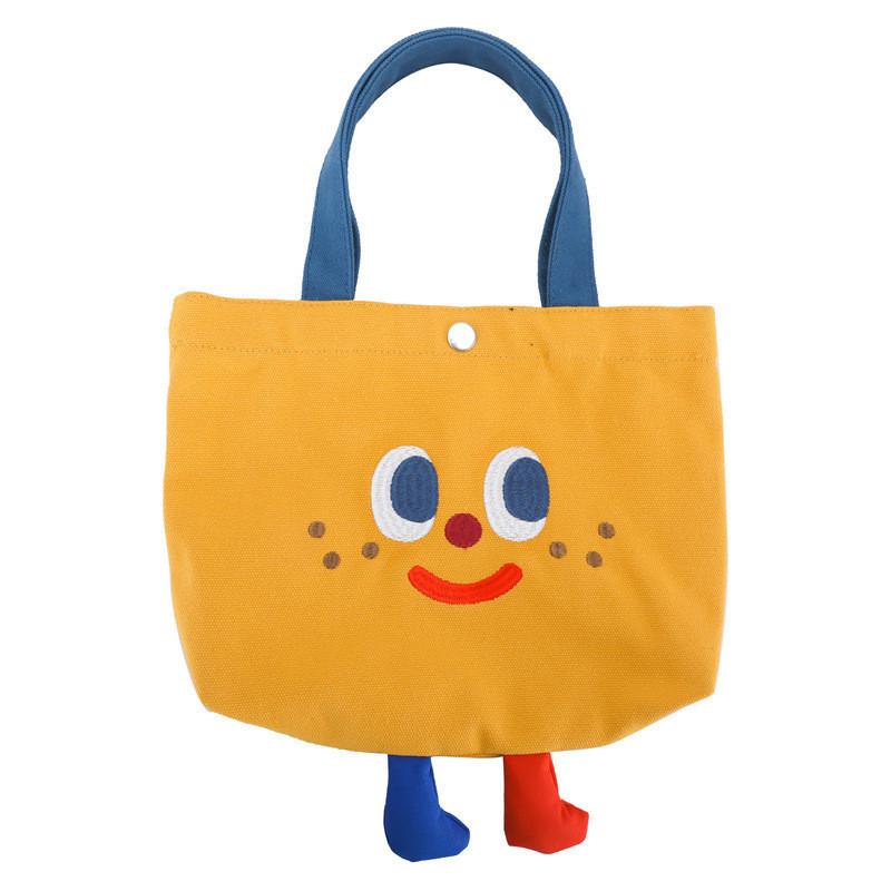 

Spring New Cute Sesame Face Print Handbag Adorable Soft Canvas Lunch Bag For Kids жовтий
