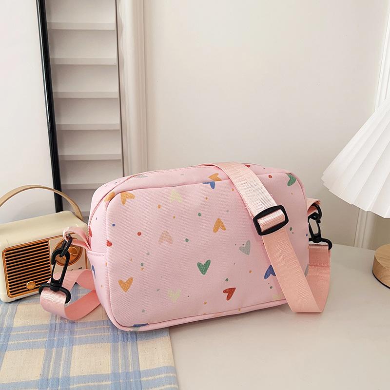 

Cute girl nylon bag new peach heart print messenger bag female student bag розовый