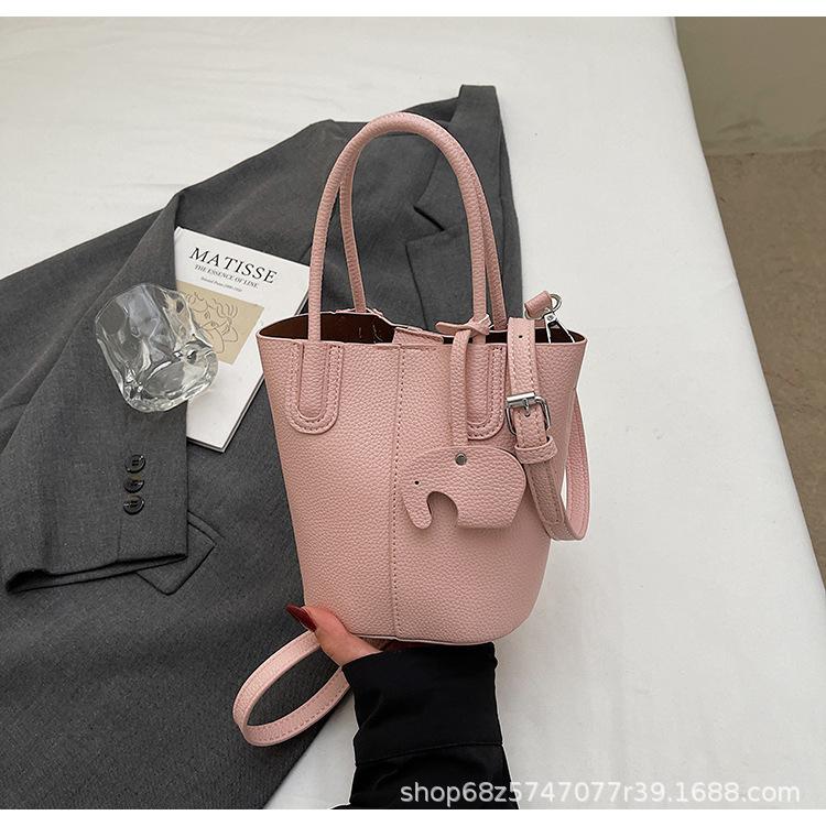 Korean simple style portable bucket bag women's 2025 summer new fashionable and popular one-shoulder crossbody vegetable basket bag