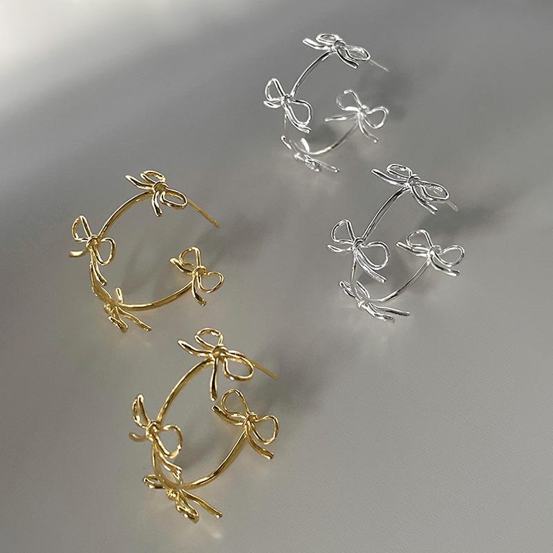 Metal Empty Bow Stud Earrings Female Niche Design Sense Simple And Elegant High-End Fashion Versatile Earrings