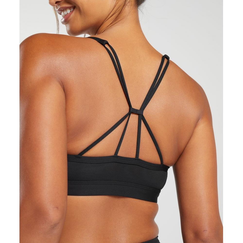 Gymshark Sutien sport cu bretele cu volan Negru B6a6i Bb2j