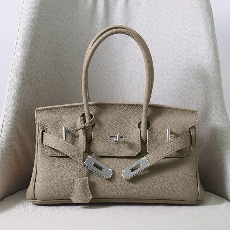 New Togo Top-layer Cowhide Horizontal Platinum Bag Large Capacity Fashion Leather Hand-to-shoulder Commuter Underarm Women's Bag