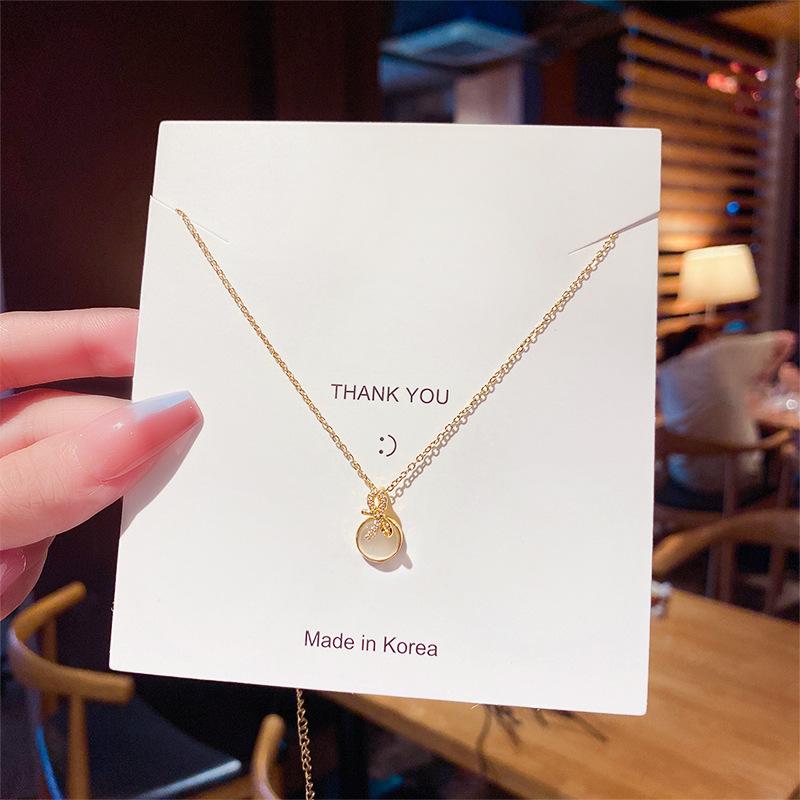 Online celebrity bow necklace titanium steel simple personality design sense Opal clavicle chain hot accessories.