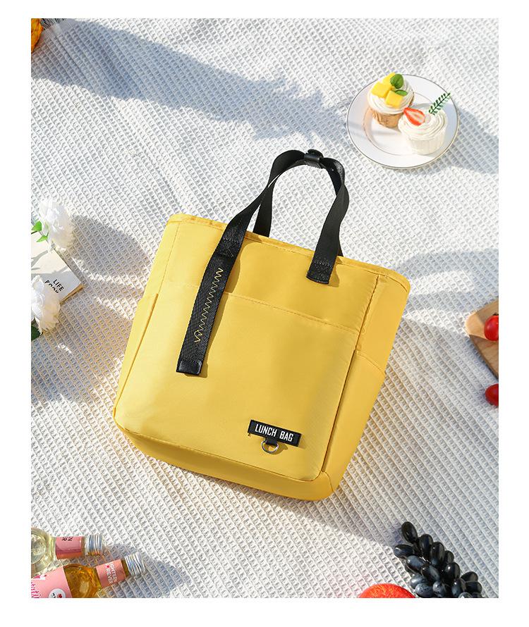 Student Lunch Box Bag - Handheld, Large Capacity, Insulated, Waterproof, for Picnics and Work.