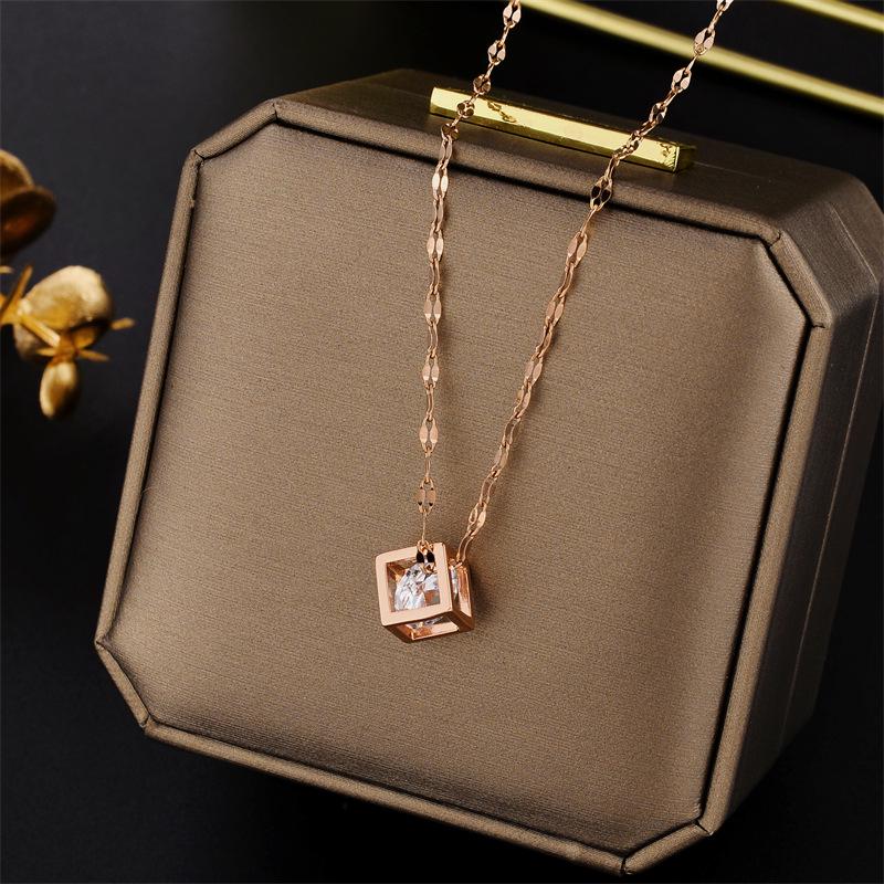 Elegant Colorfast 18K Rose Gold Necklace with Swan & Four-Leaf Clover Charm