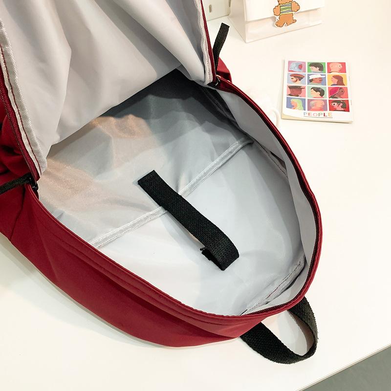 School bag new fashion solid color large capacity school bag Korean version ins versatile simple backpack casual spring outing light backpack